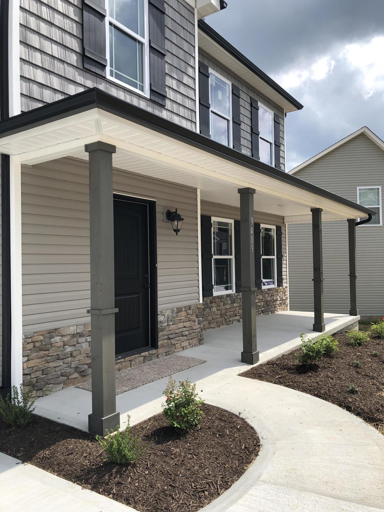 3409 Boulder Point Lane Powell, TN 37849 - Photo 3 of 34 Stunning front porch with stone accents