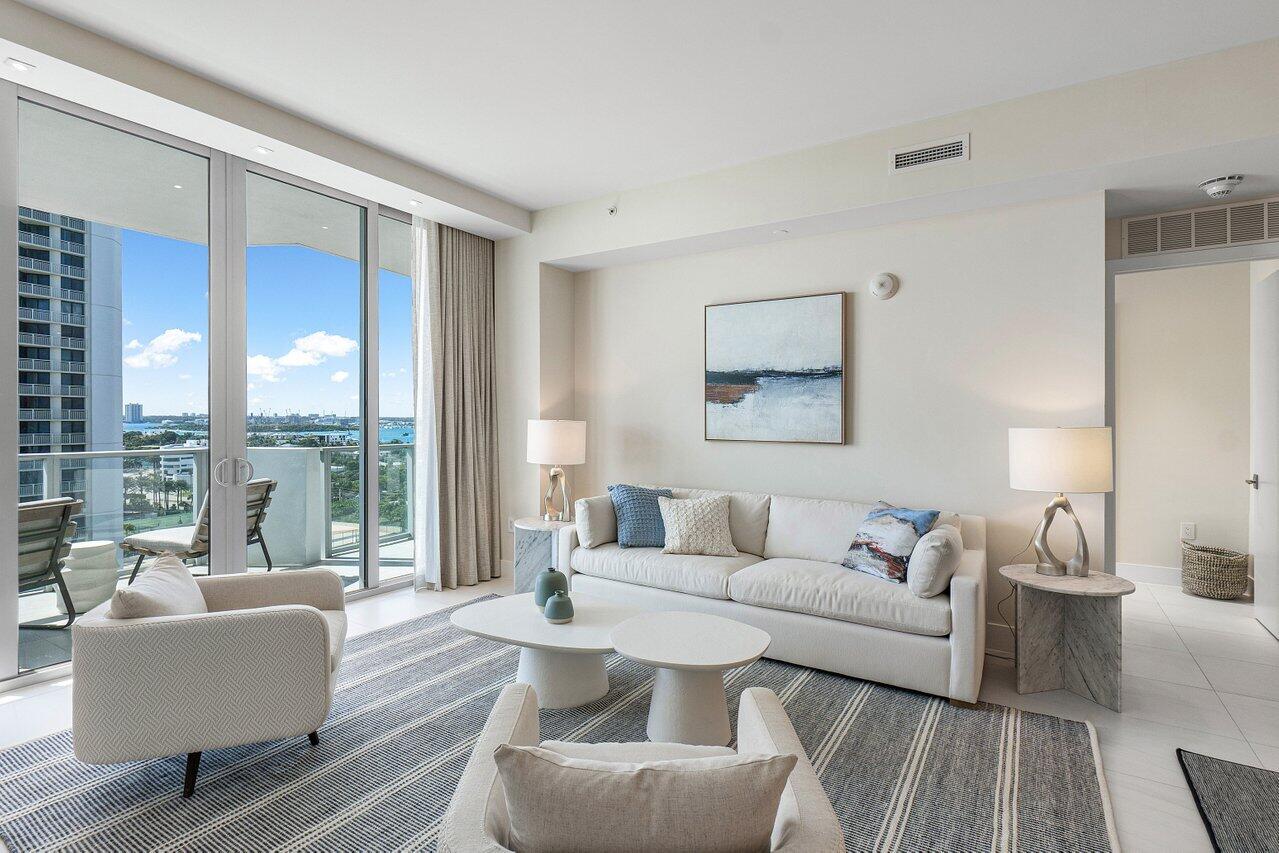 3100 North Ocean Drive, Unit H1205 Singer Island, FL 33404 - Photo 7 of 35 a living room with furniture and a large window