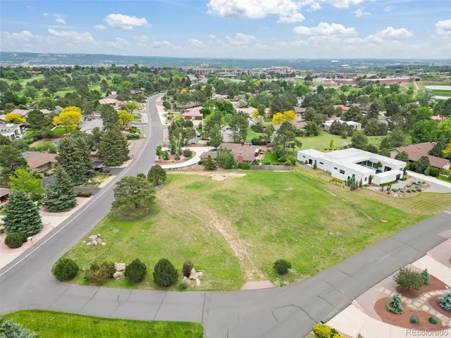 a view of a lake with a city