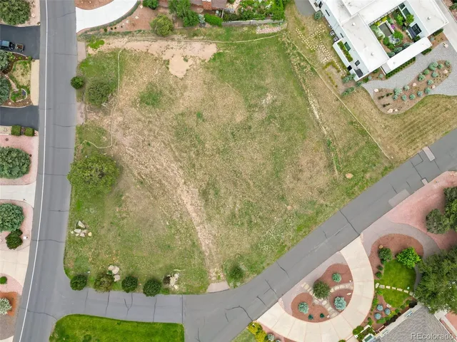 an aerial view of a house with a garden