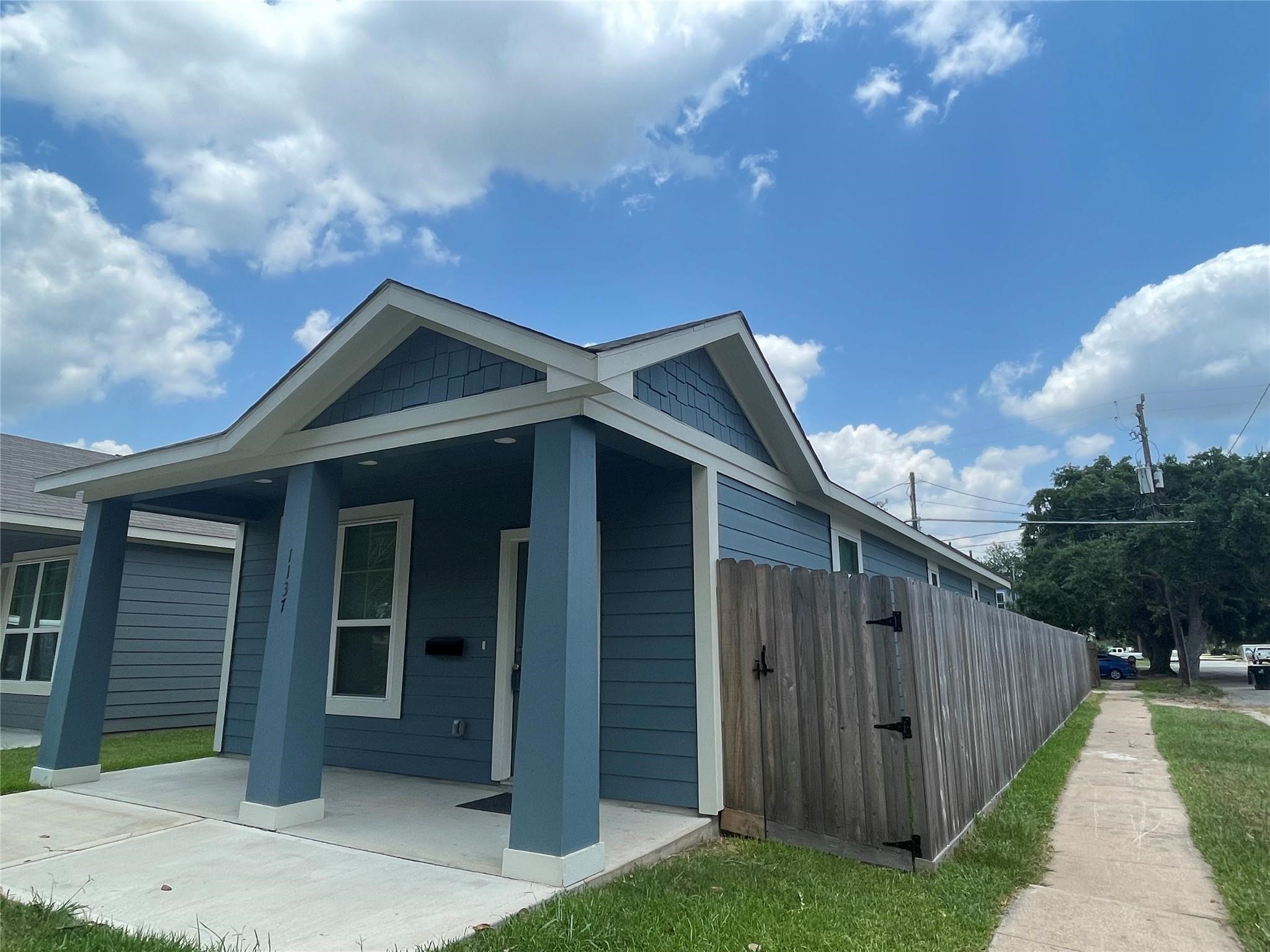1137 4th Street Rosenberg, TX 77471 - Photo 14 of 16 a view of a house with wooden fence