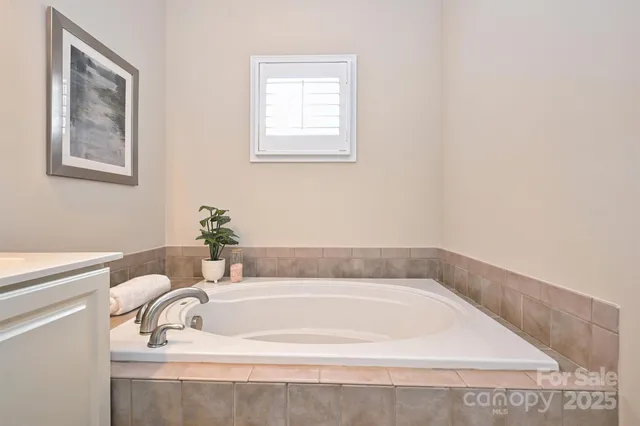 a bathroom with bathtub