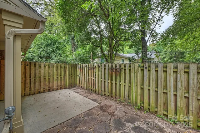 a view of a wooden fence