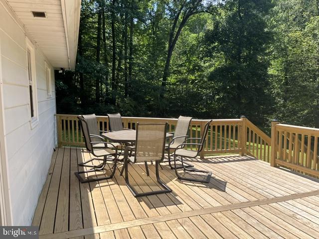 1663 Sawmill Road Spring City, PA 19475 - Photo 19 of 26 Deck off kitchen with stunning views of woods