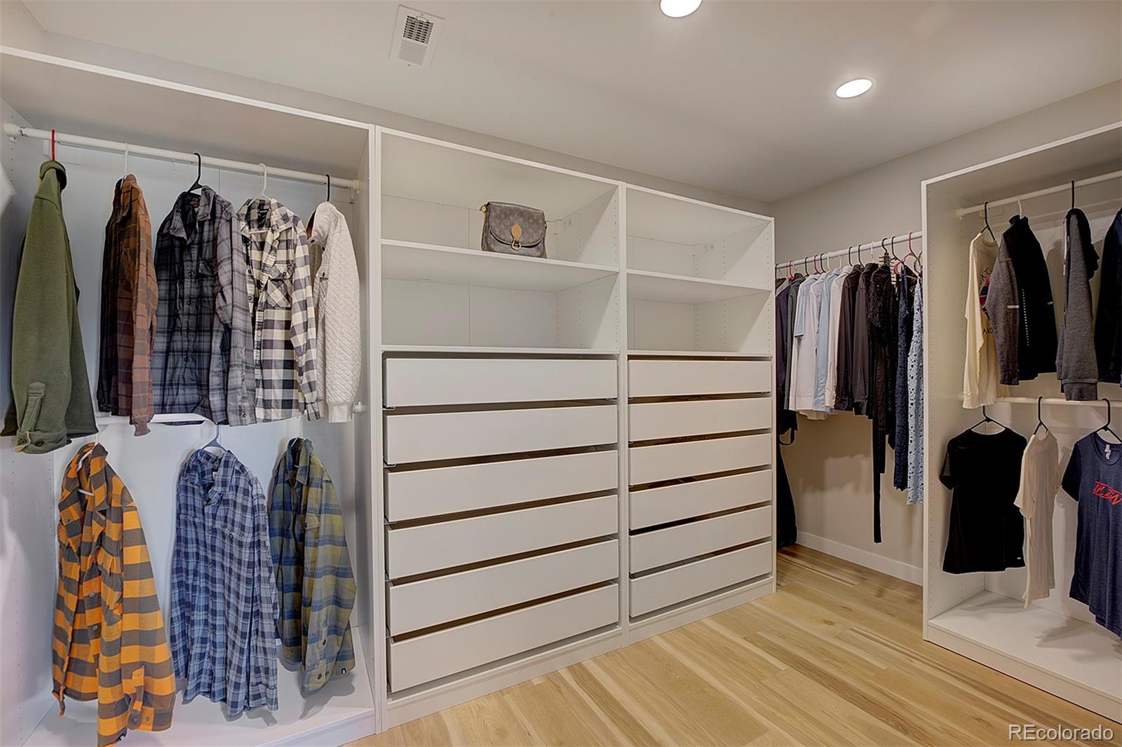 81 Fir Lane Bailey, CO 80421 - Photo 21 of 33 a view of walk in closet with clothes and shoes