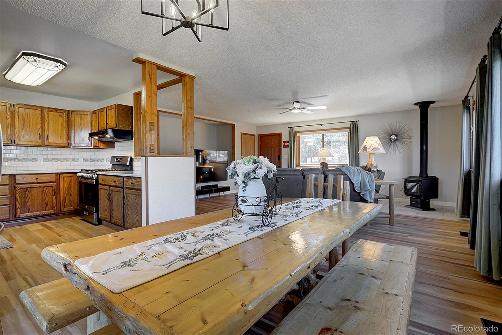 81 Fir Lane Bailey, CO 80421 - Photo 9 of 33 a large kitchen with granite countertop lots of counter top space