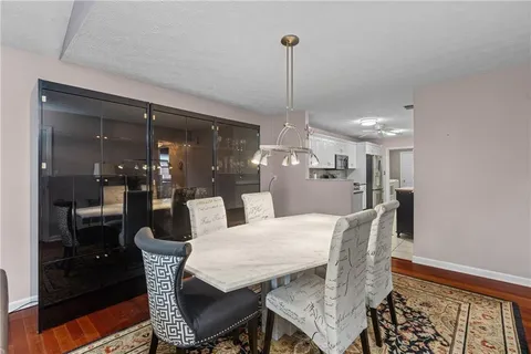 a view of a dining room with furniture
