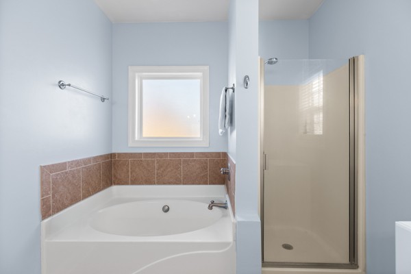 4017 Brimestone Way Greenbrier, TN 37073 - Photo 7 of 13 a white bath tub sitting next to a window
