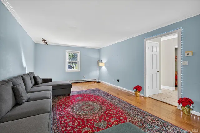 a living room with furniture and window