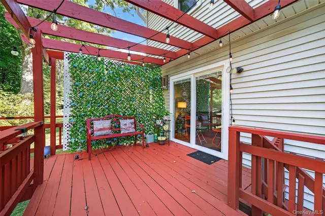 a balcony with wooden floor