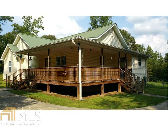 910 Pea Ridge Road Franklin, GA 30217 - Photo 1 of 1 a view of house with backyard