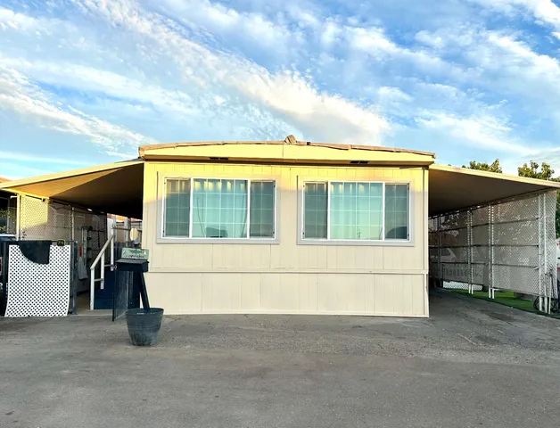 a view of house with a outdoor space