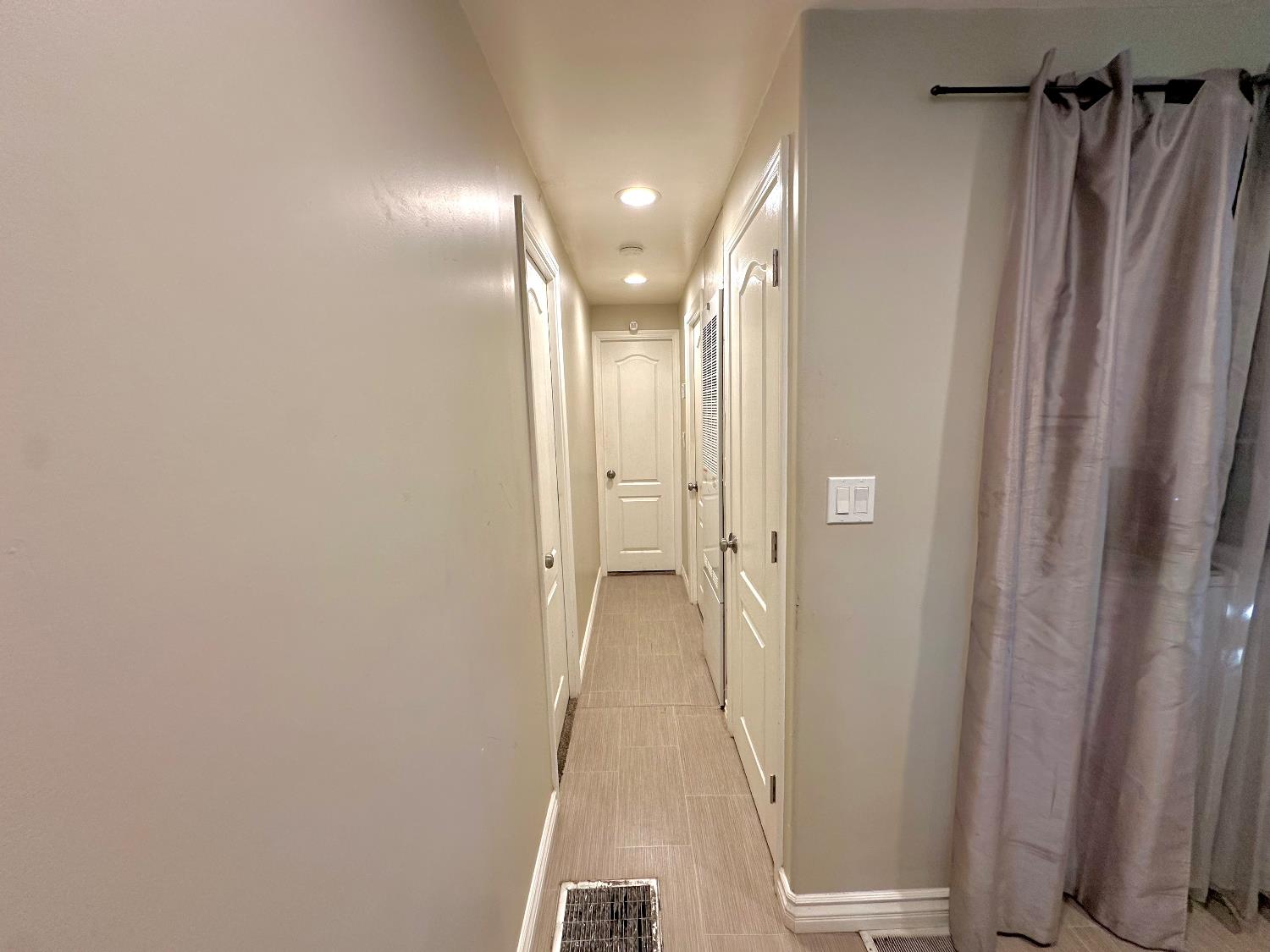 3435 Marfargoa Road, Unit 74 Stockton, CA 95215 - Photo 16 of 21 a view of a hallway with windows and closet