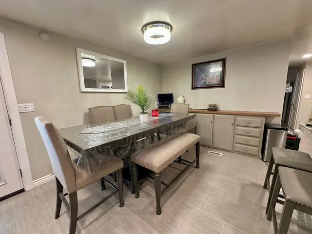 a view of a workspace with furniture