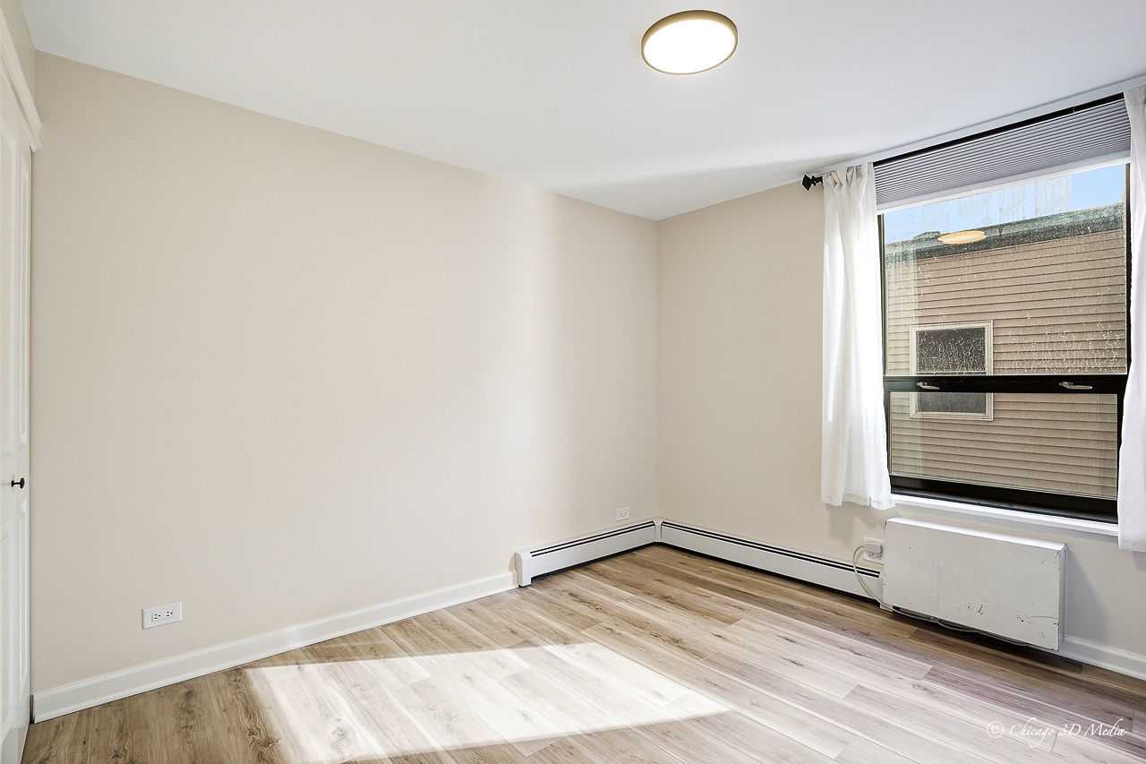 3900 North Pine Grove Avenue, Unit 409 Chicago, IL 60613 - Photo 17 of 24