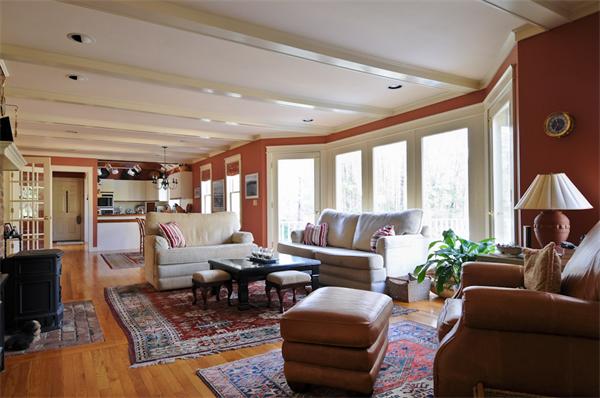 9 Bishop Road Rochester, MA 02770 - Photo 2 of 9 a living room with furniture large windows and wooden floor
