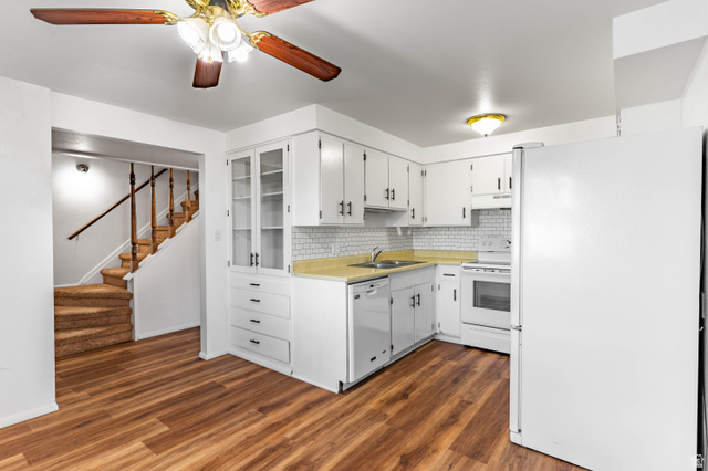 728 400 East Orem, UT 84097 - Photo 8 of 30 Kitchen featuring white cabinetry, white appliances, light-colored countertops, and white subway tile backsplash