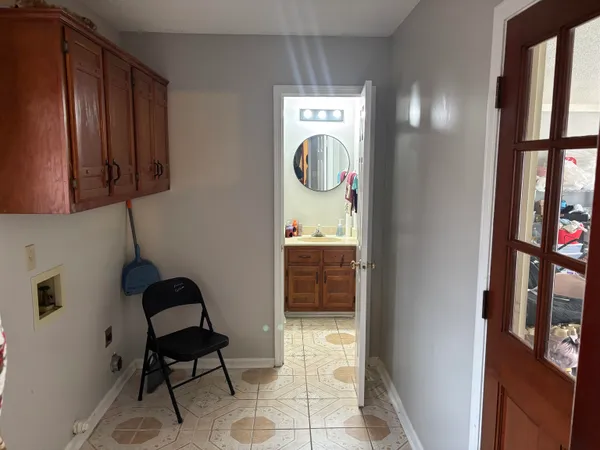 a front view of a house with parking space