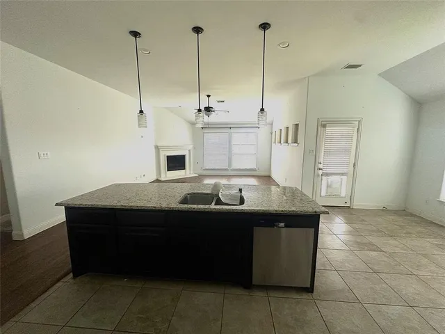 a room with a table and chairs