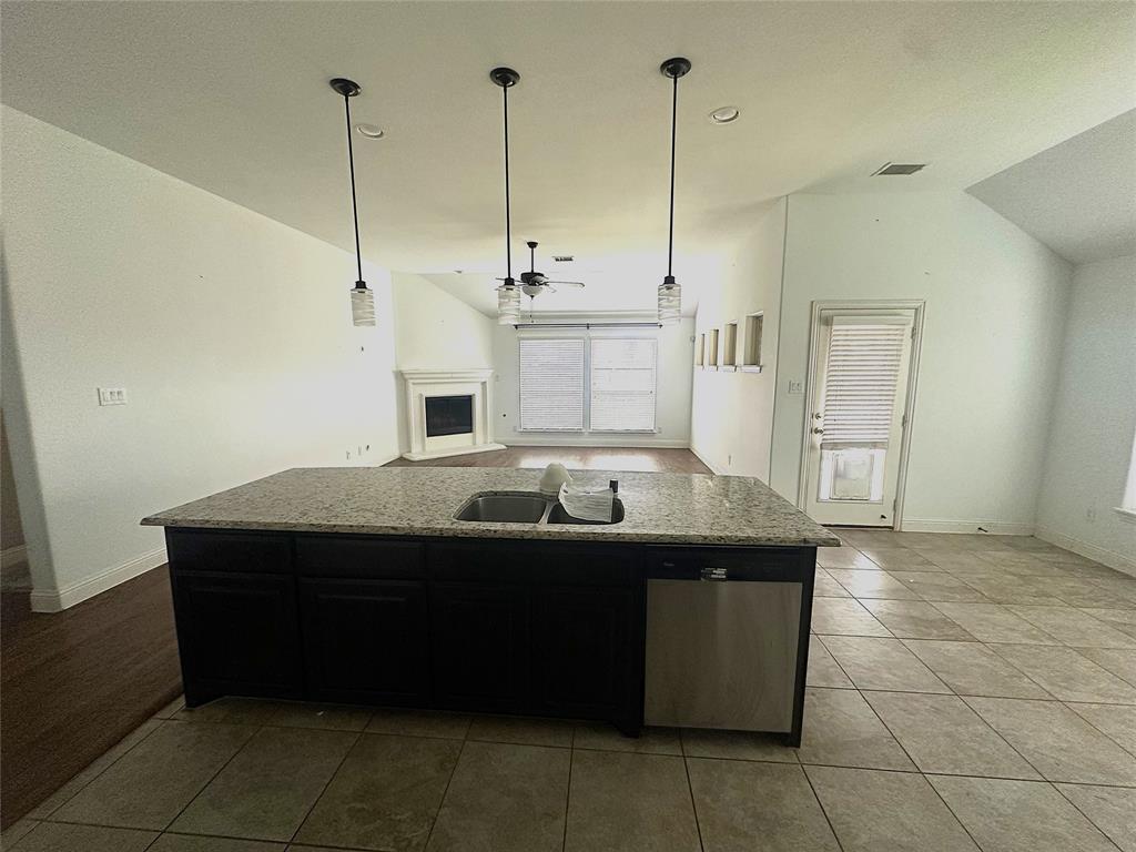 2403 Wilson Drive Anna, TX 75409 - Photo 5 of 13 a room with a table and chairs