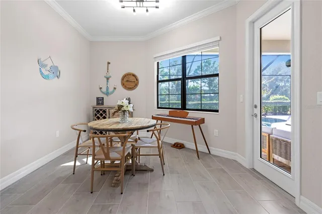 a bathroom with a shower sink and mirror