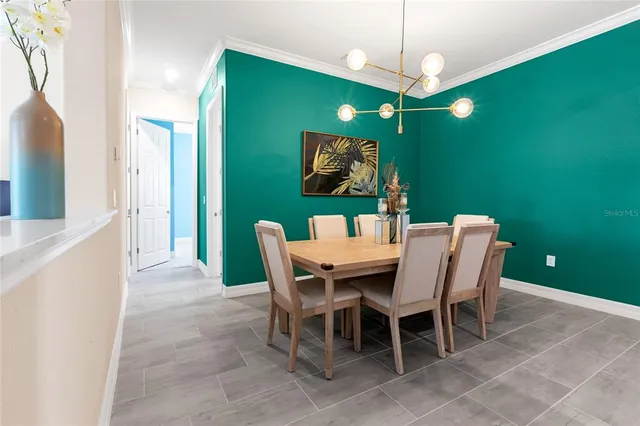 a bathroom with a double vanity sink and mirror
