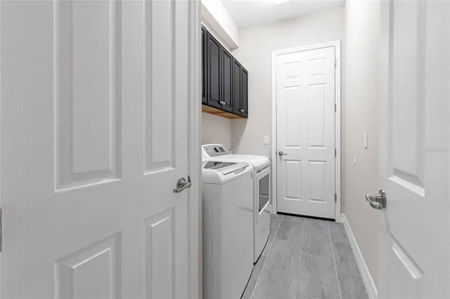 a view of fountain in the middle of a lake