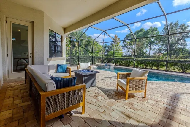 an aerial view of multiple houses with yard