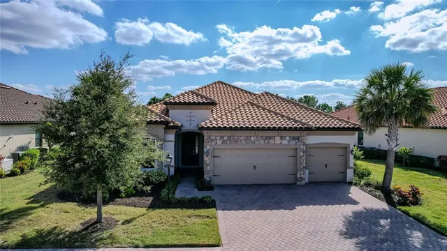 an aerial view of a house with outdoor space swimming pool and outdoor seating
