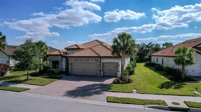 a view of a swimming pool with a bench