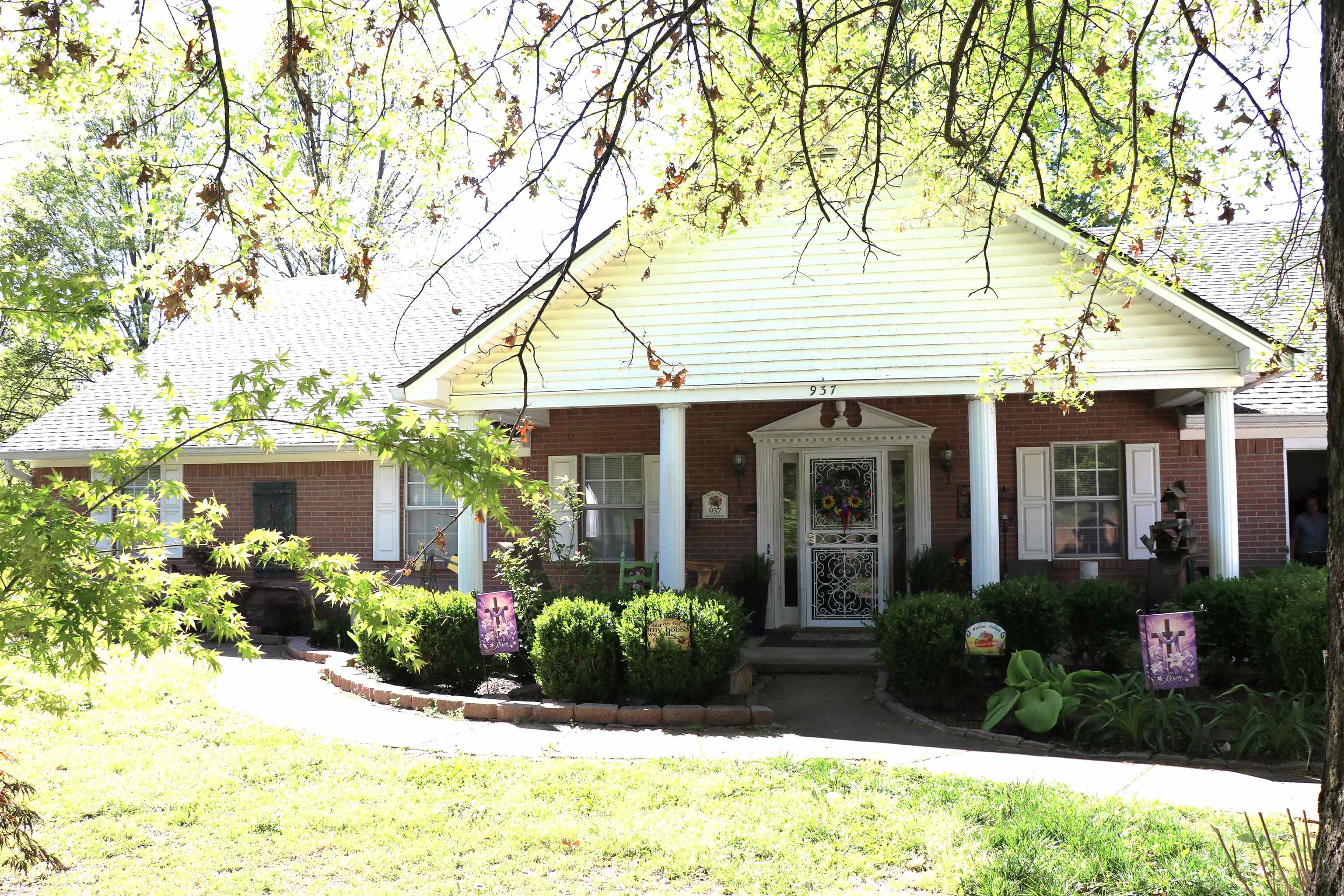 937 Kelleys Chapel Road Burlison, TN 38015 - Photo 1 of 27 View of front of home with a porch, brick siding, and a front lawn