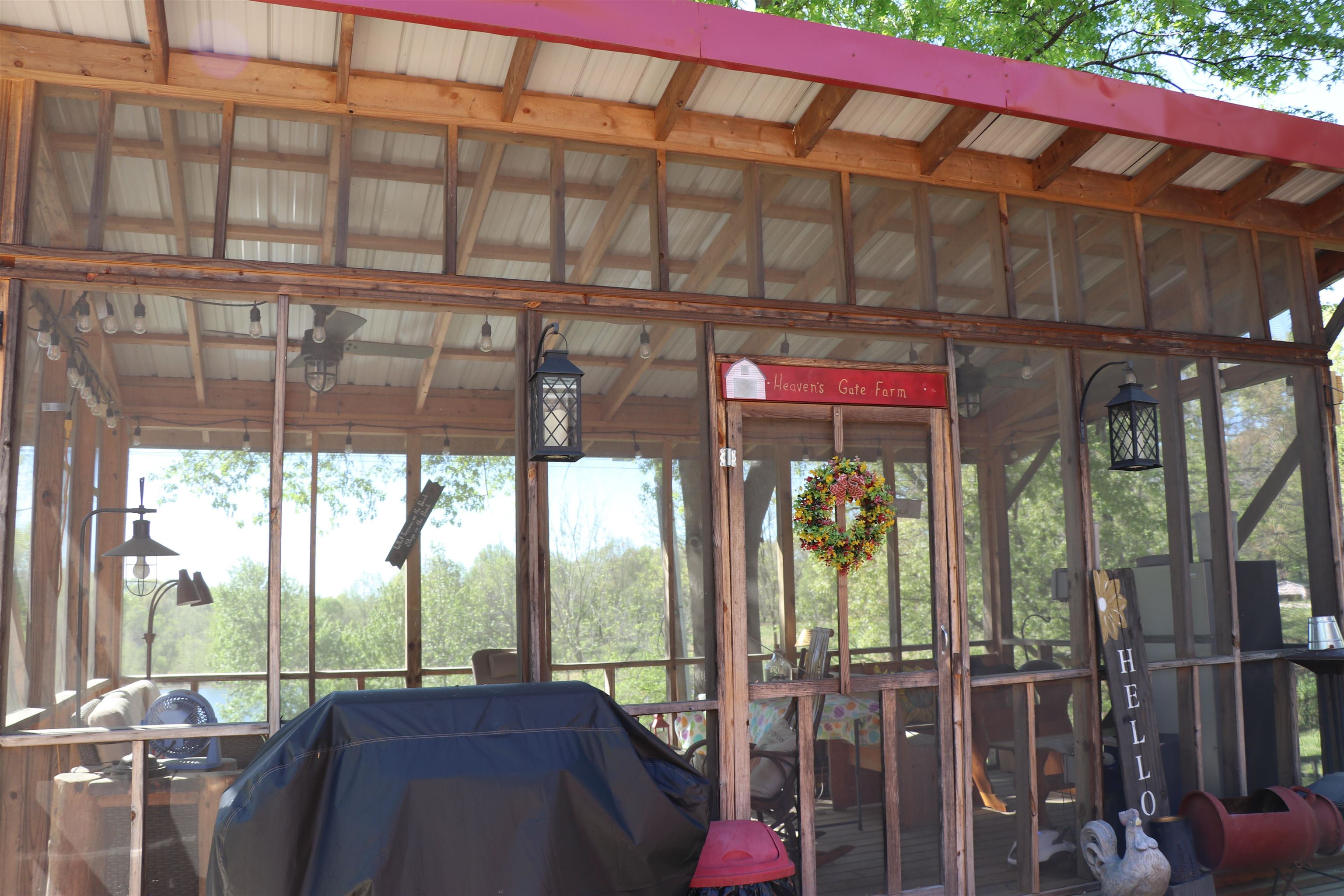 937 Kelleys Chapel Road Burlison, TN 38015 - Photo 15 of 27 Sunroom with healthy amount of natural light and lofted ceiling with beams