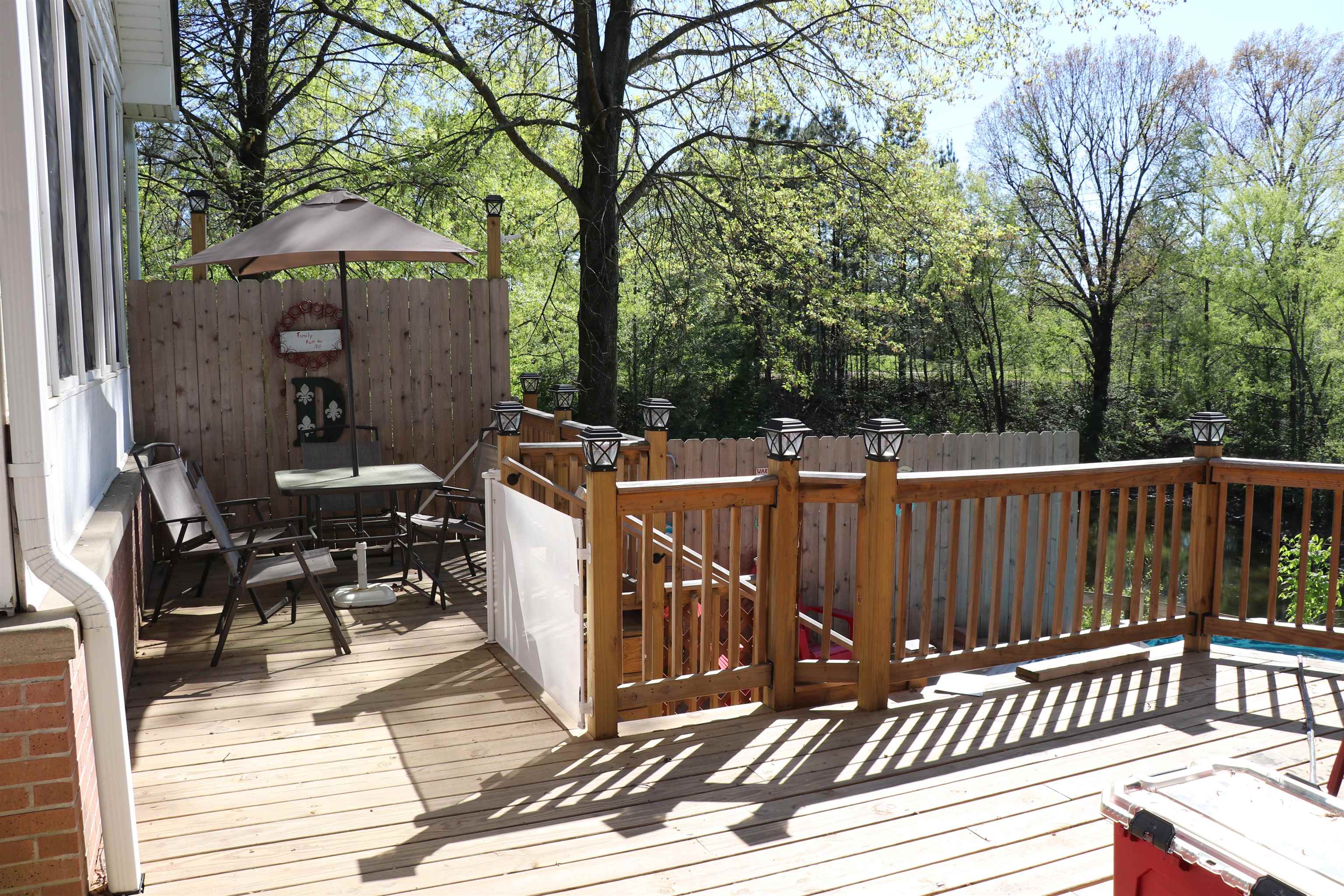 937 Kelleys Chapel Road Burlison, TN 38015 - Photo 16 of 27 Wooden terrace with outdoor dining space