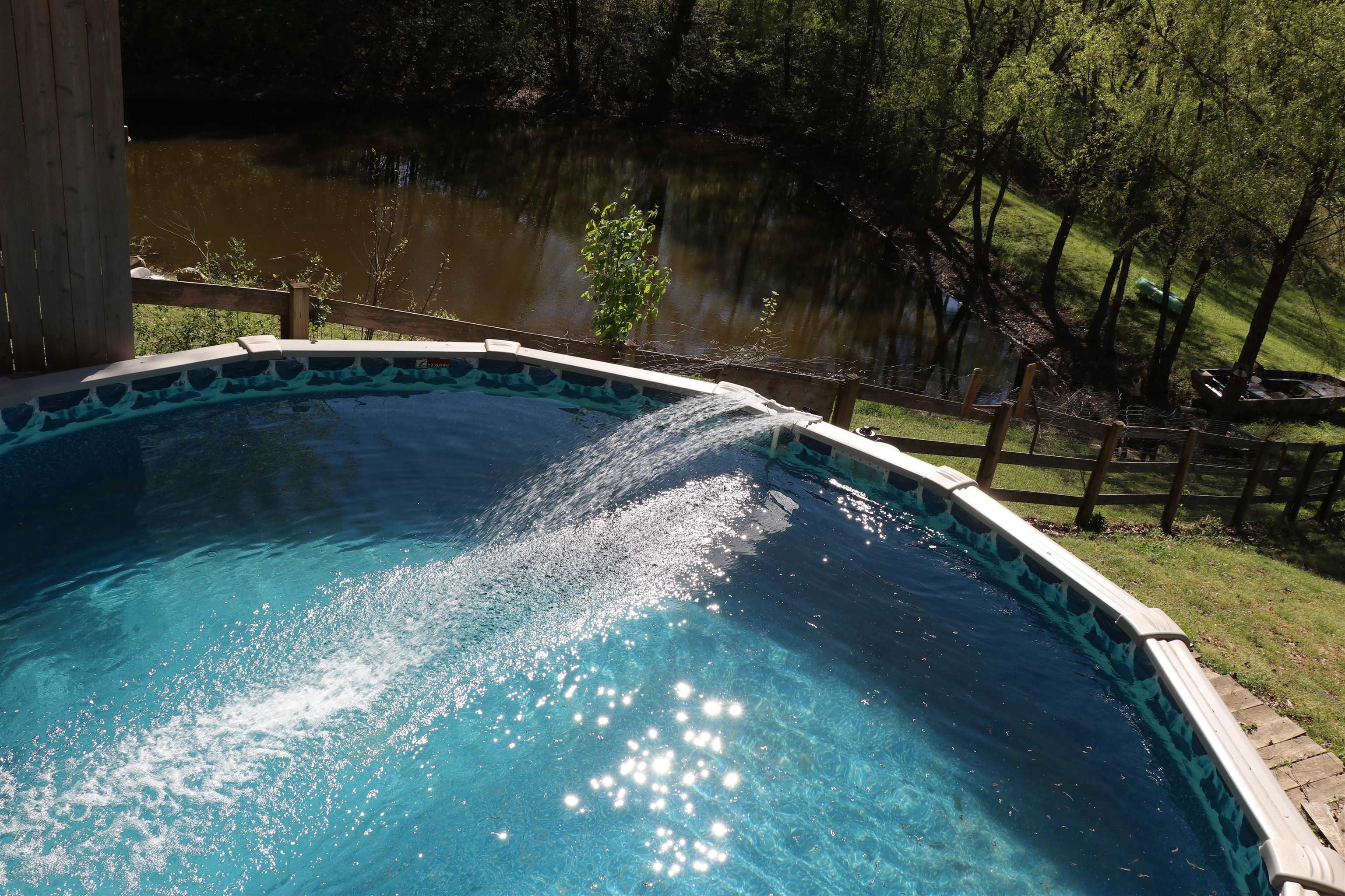 937 Kelleys Chapel Road Burlison, TN 38015 - Photo 19 of 27 View of swimming pool with a pool and a water view