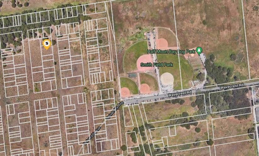 a bathroom with a mirror and shower