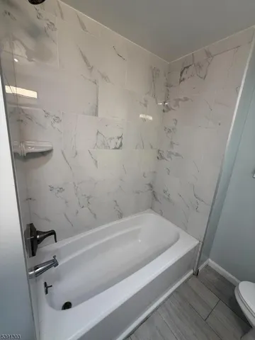 a bathroom with a bathtub