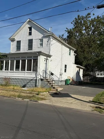 a view of a house with a swimming pool