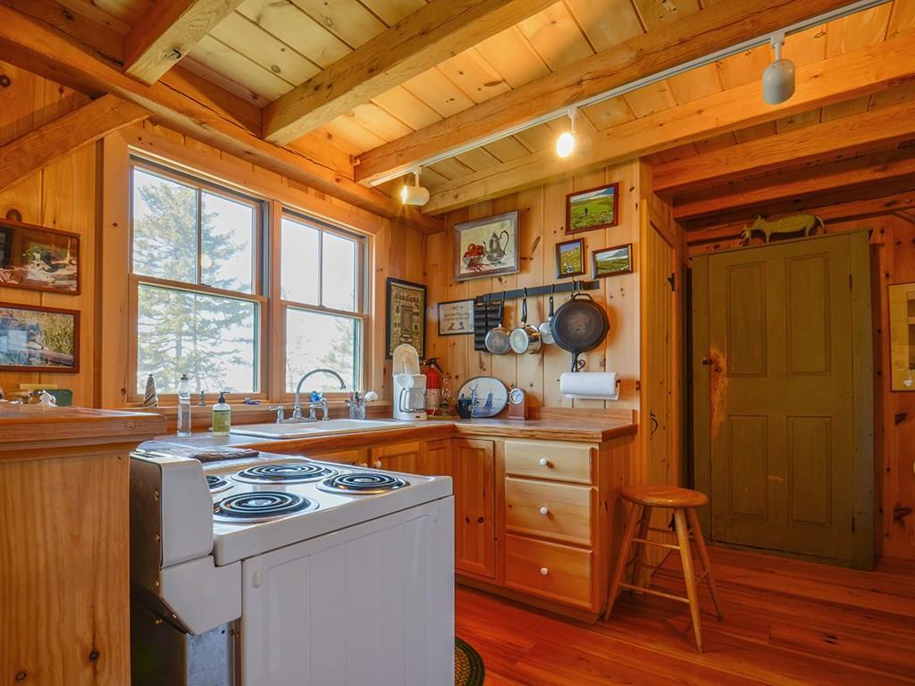 555 Jericho Bay Road Swans Island, ME 04685 - Photo 18 of 35 Kitchen with view from the sink.