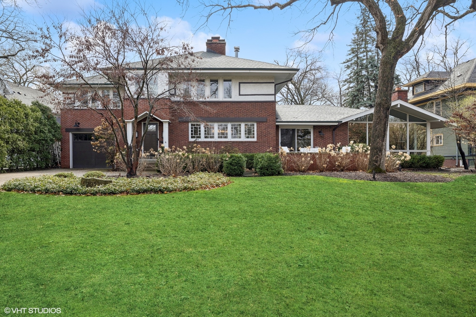 205 Bloomingbank Road Riverside, IL 60546 - Photo 2 of 46 a front view of house with yard and green space