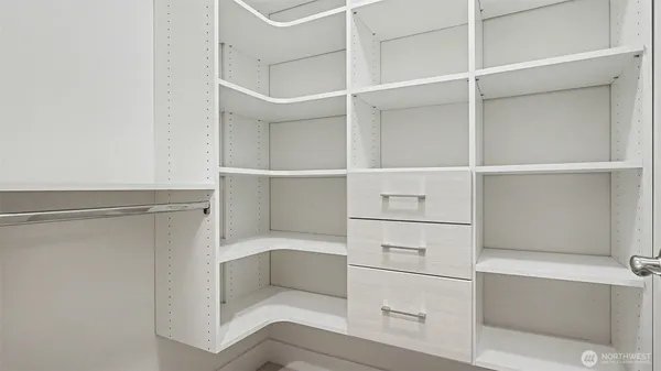 a view of an empty walk in closet