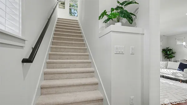 a view of entryway with wooden floor
