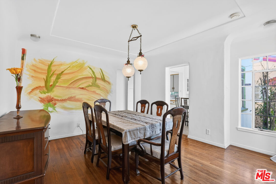 1544 South Point View Street Los Angeles, CA 90035 - Photo 17 of 67 a dining room with furniture and window