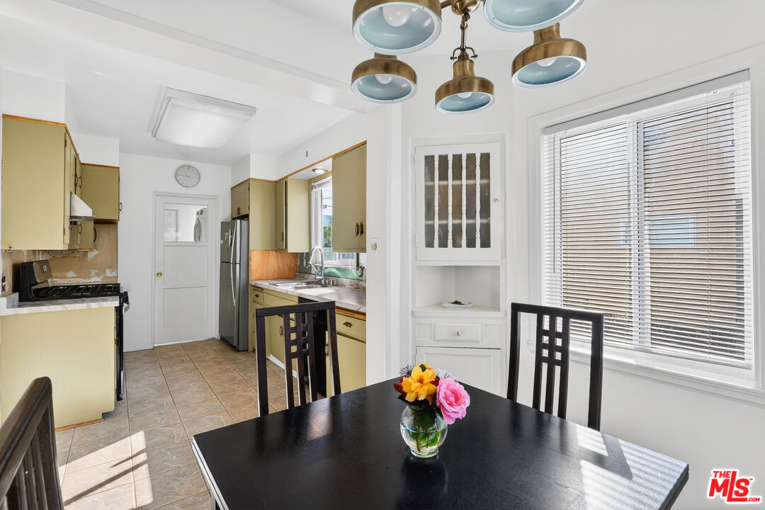 1544 South Point View Street Los Angeles, CA 90035 - Photo 21 of 67 a view of kitchen with furniture and wooden floor