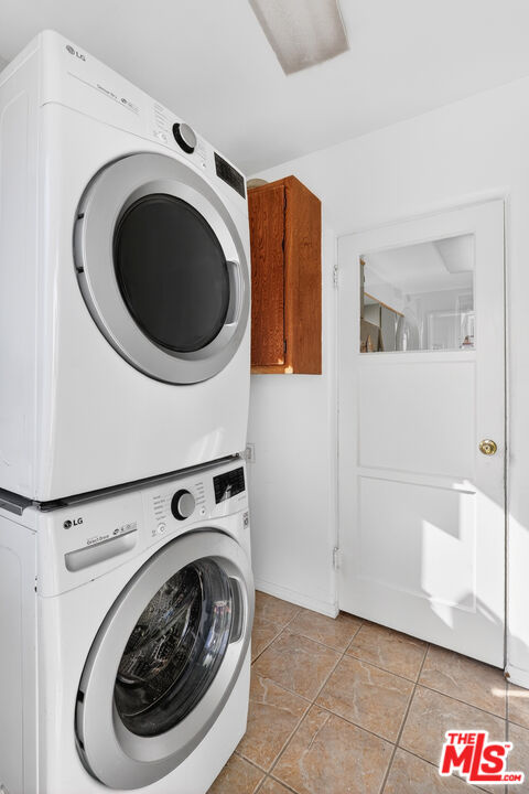 1544 South Point View Street Los Angeles, CA 90035 - Photo 29 of 67 a utility room with dryer and washer