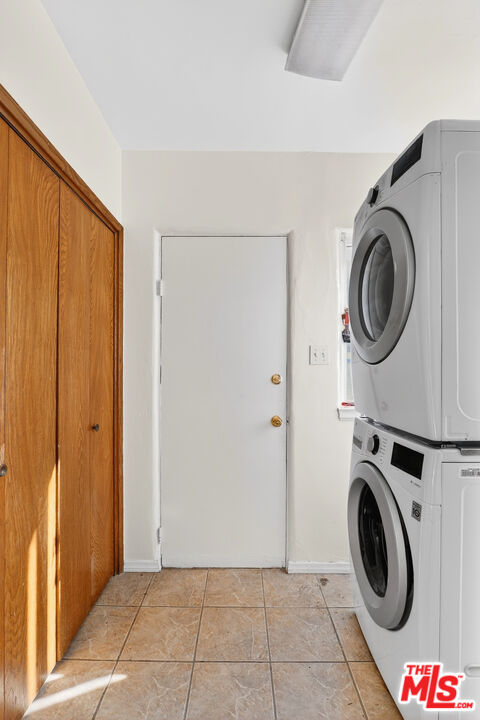 1544 South Point View Street Los Angeles, CA 90035 - Photo 31 of 67 a view of a storage & utility room with washer and dryer