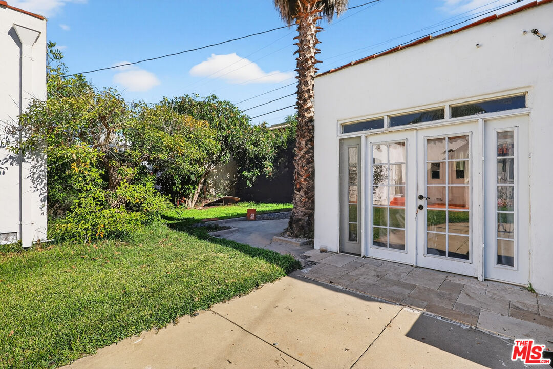 1544 South Point View Street Los Angeles, CA 90035 - Photo 50 of 67 a view of a house with backyard and porch