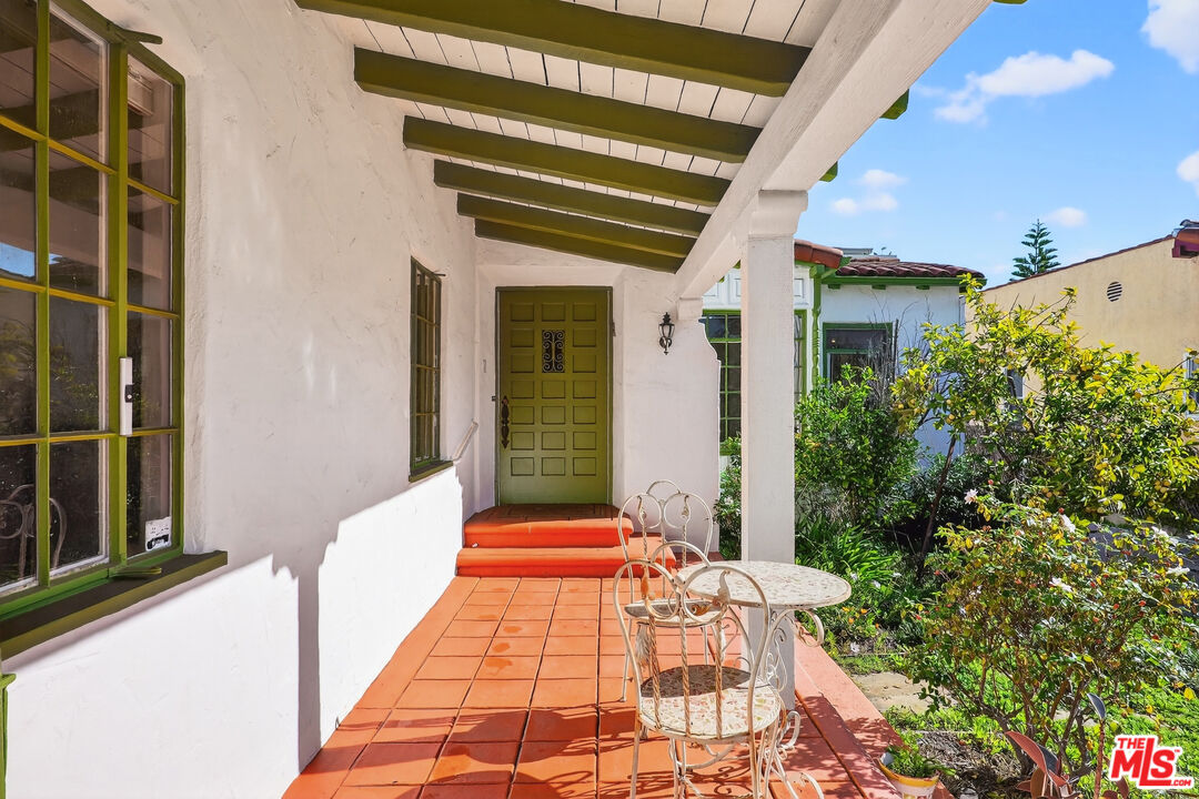 1544 South Point View Street Los Angeles, CA 90035 - Photo 8 of 67 a front view of a house with plants