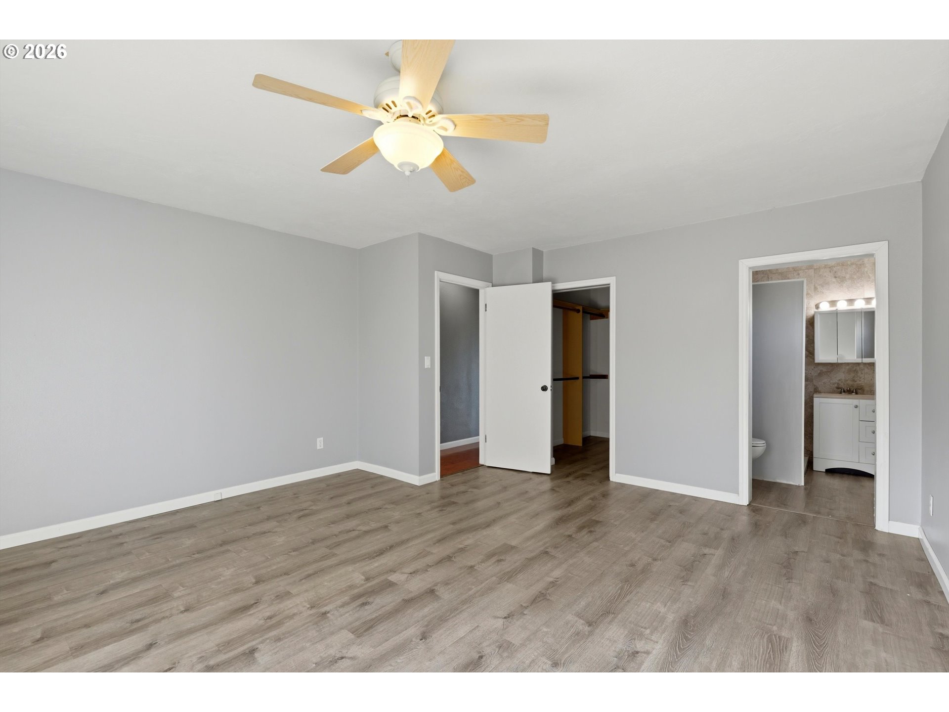 1829 East 8th Street The Dalles, OR 97058 - Photo 12 of 48 a view of an empty room with wooden floor