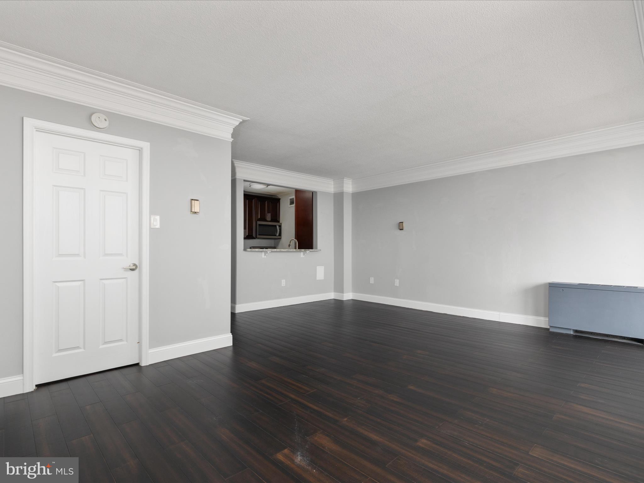 4141 North Henderson Road, Unit 809 Arlington, VA 22203 - Photo 5 of 21 a view of a livingroom with wooden floor