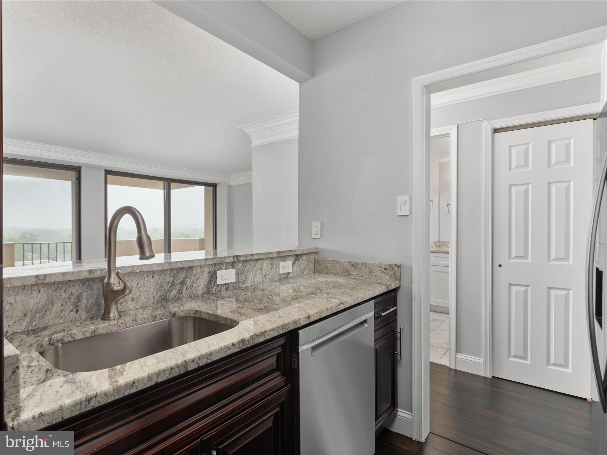 4141 North Henderson Road, Unit 809 Arlington, VA 22203 - Photo 6 of 21 a close view of sink and tap